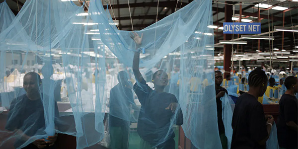 A factory producing insecticidal bed nets in Arusha, Tanzania. Photo by Charles Ommanney/Getty Images